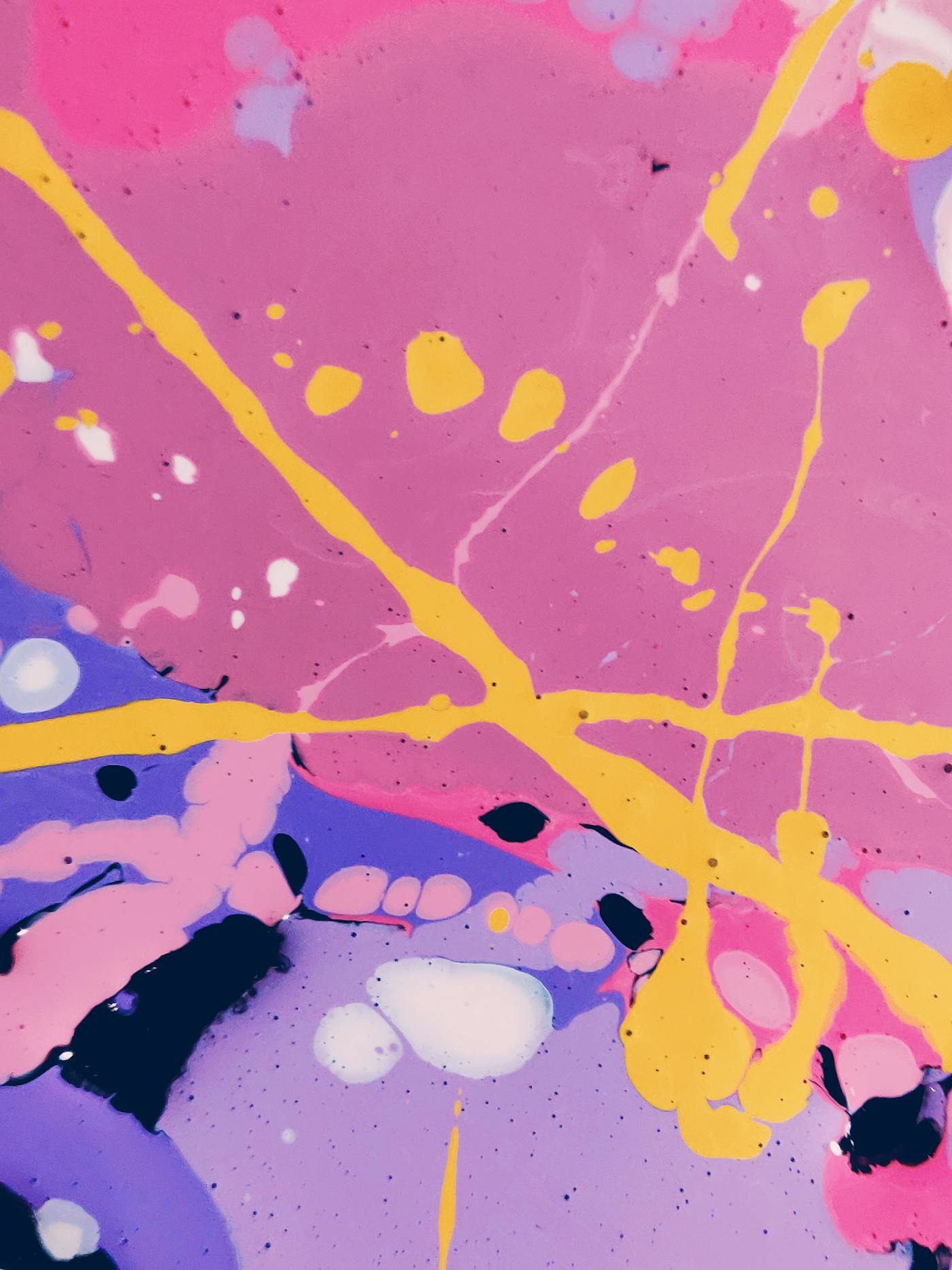 Layered paint spills in mixed tones